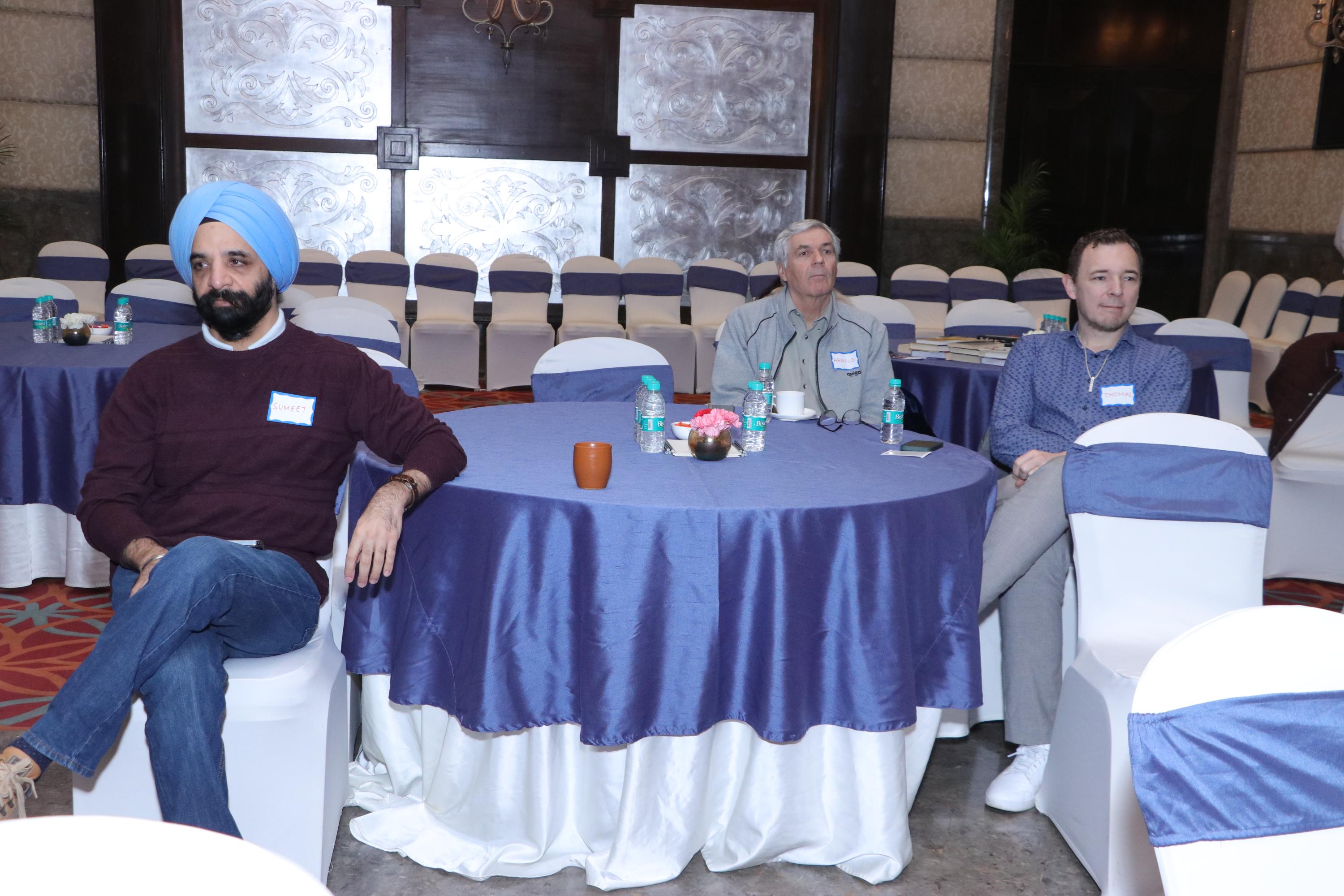 Attendees discussing agile leadership strategies